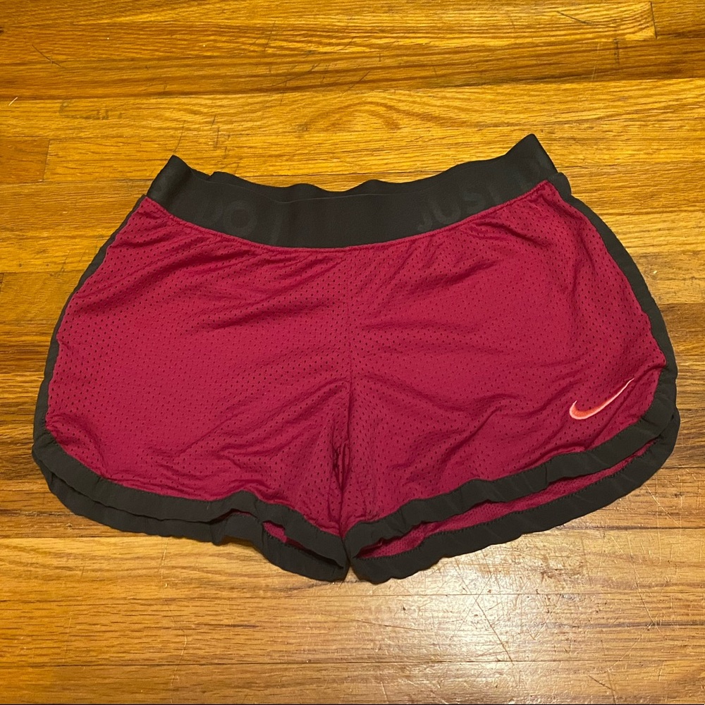 Pink Nike running shorts
